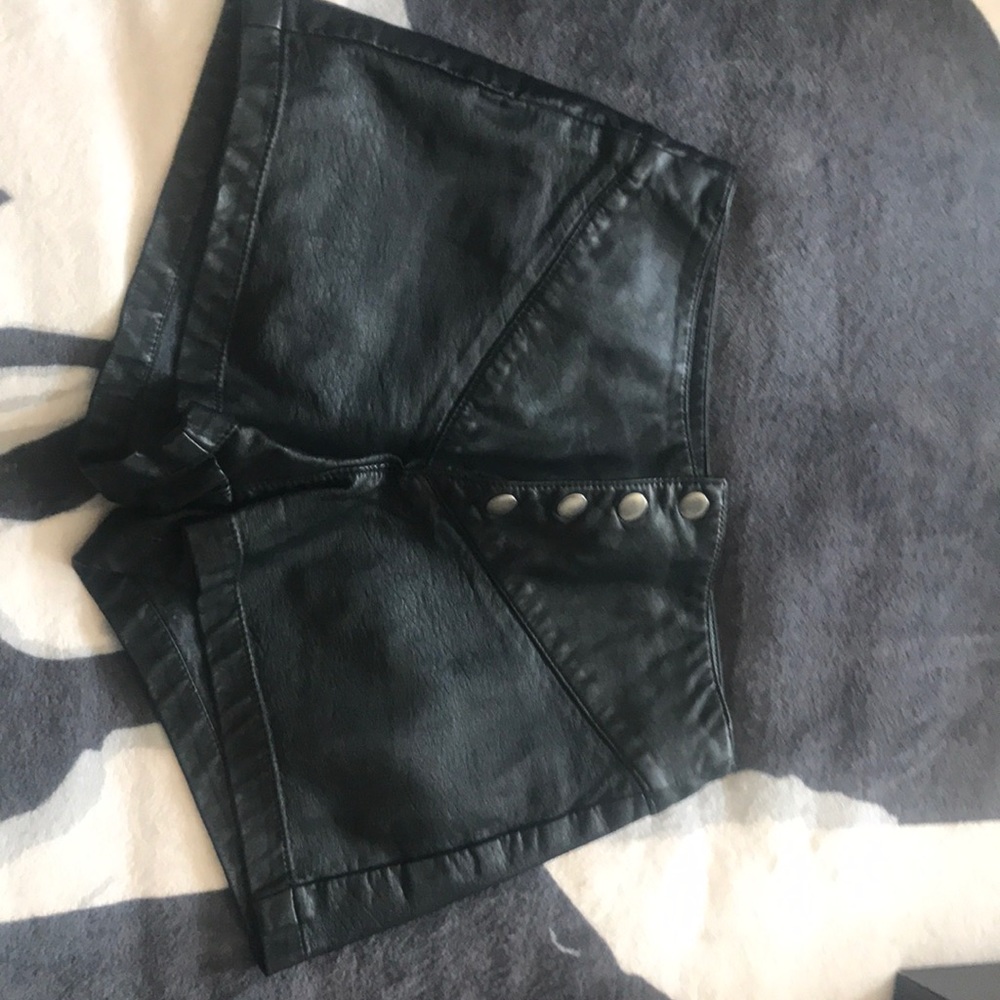 Black button fly leather high waisted shorts